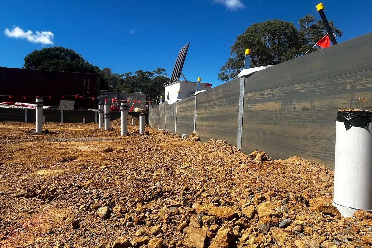 SuperSleeper wall beside site services and drainage works