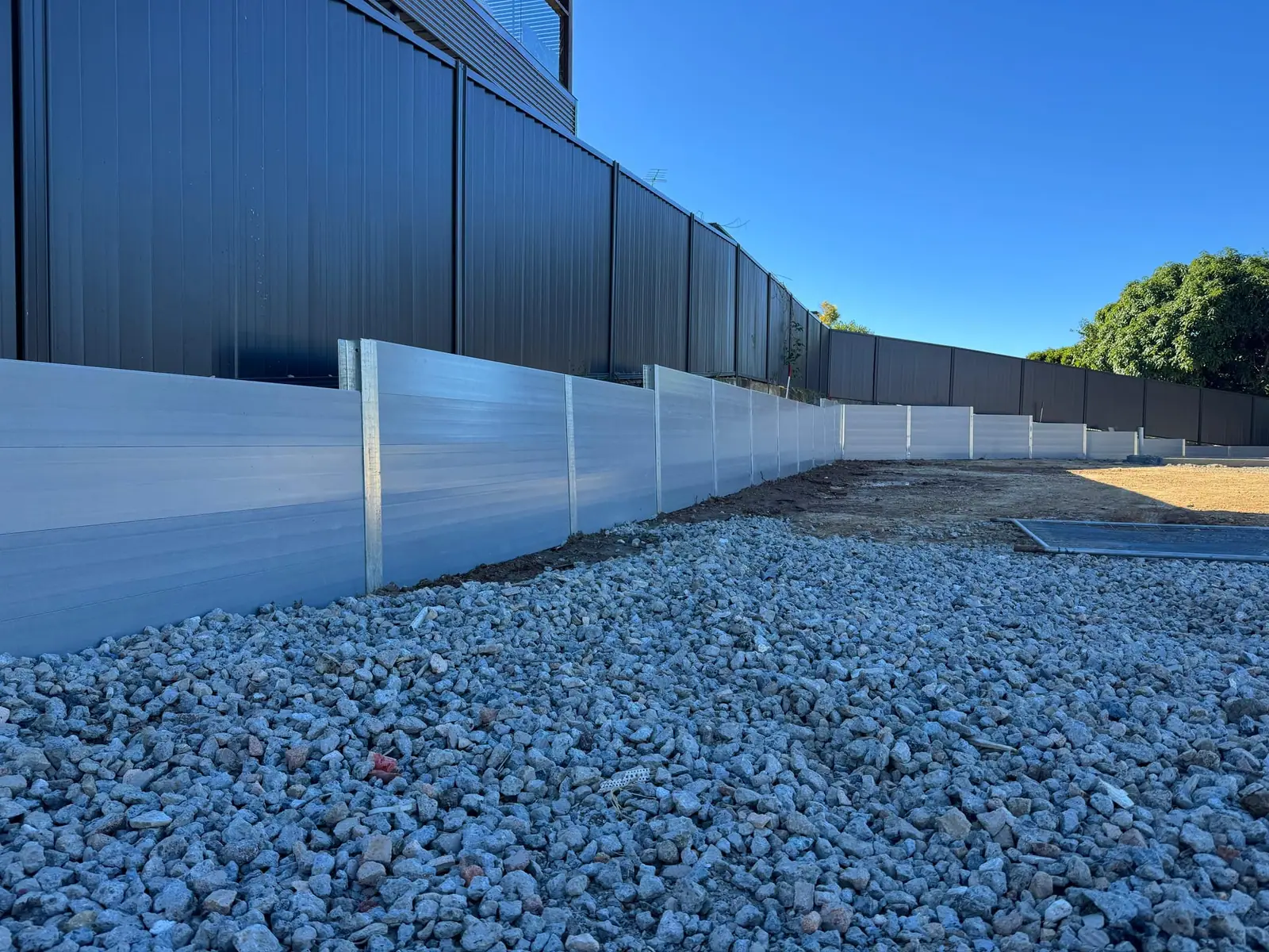 Residential SuperSleeper retaining wall beside a home