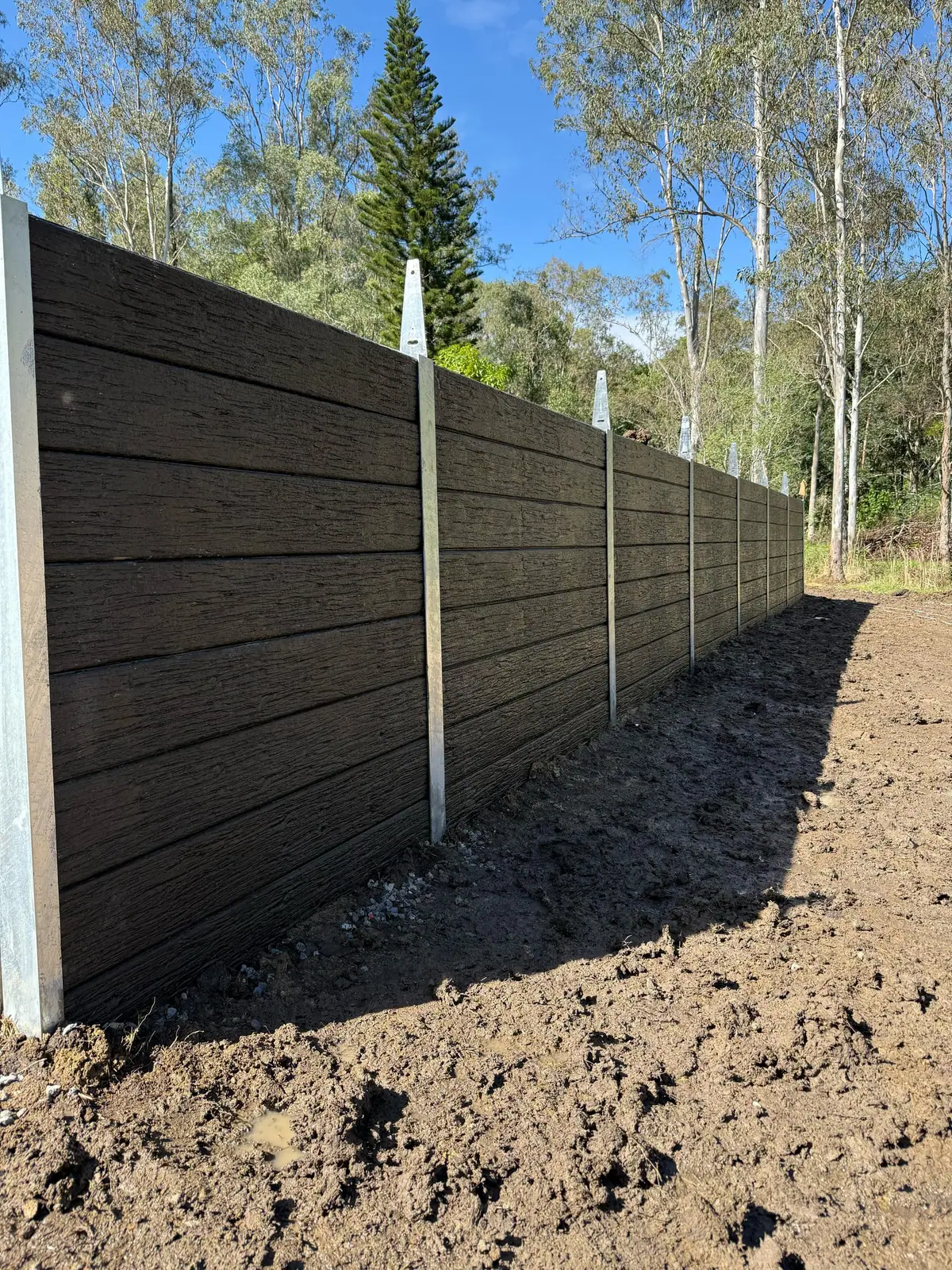 Commercial timber-look concrete sleeper retaining wall